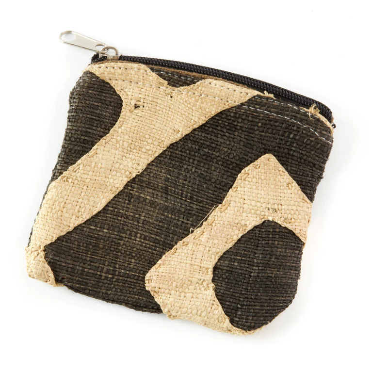 Handwoven, rectangular pouch with a zipper closure, featuring a black and beige abstract pattern. Made of natural fiber materials, showcasing a textured, artisanal design.