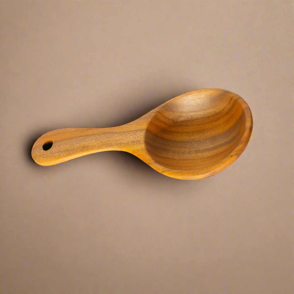 Handcrafted wooden scoop with a smooth finish, ideal for measuring coffee, spices, or dry ingredients. Made from natural wood, featuring a sturdy handle with a hanging hole for convenience.