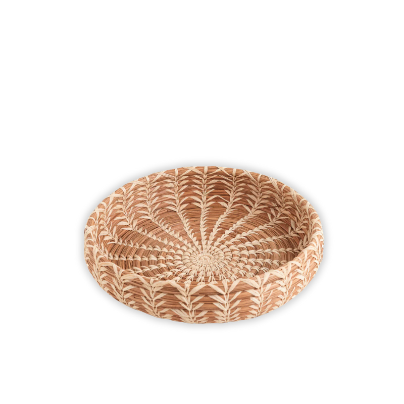 Handwoven pine needle basket with intricate natural patterns, showcasing artisanal craftsmanship. Perfect for decor, serving, or storing small items in a rustic, eco-friendly style.