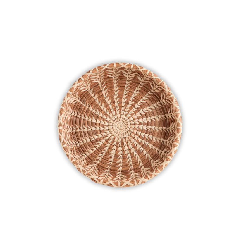 Handwoven pine needle basket with intricate natural patterns, showcasing artisanal craftsmanship. Perfect for decor, serving, or storing small items in a rustic, eco-friendly style.