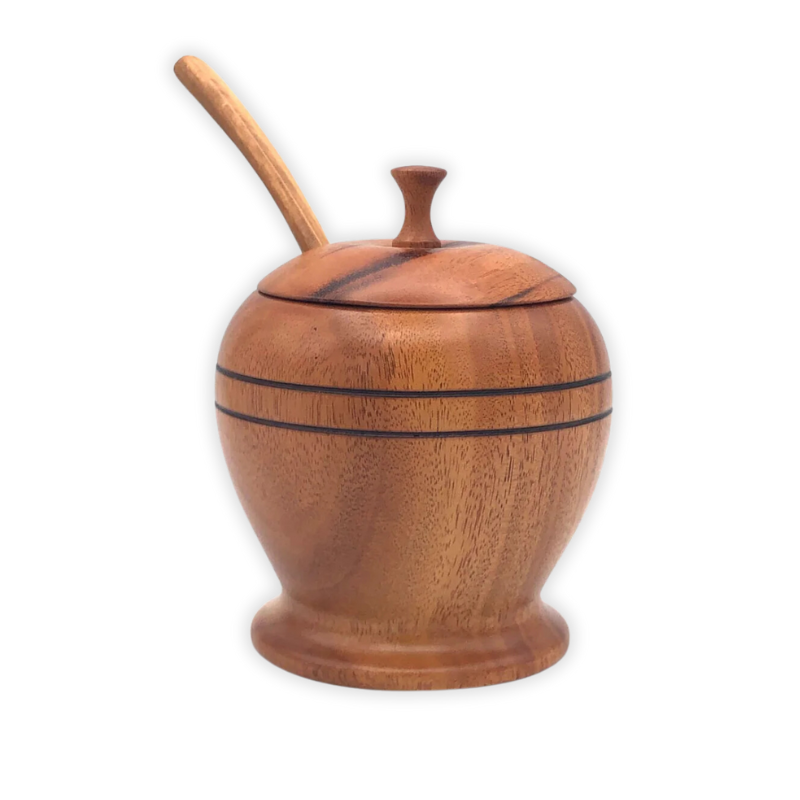 Handcrafted wooden sugar bowl with a matching lid and spoon, featuring a smooth finish and natural wood grain. Perfect for storing sugar, honey, or small condiments in rustic elegance.